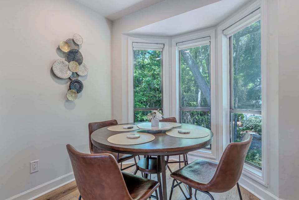 Dining room ready for meals and conversation.