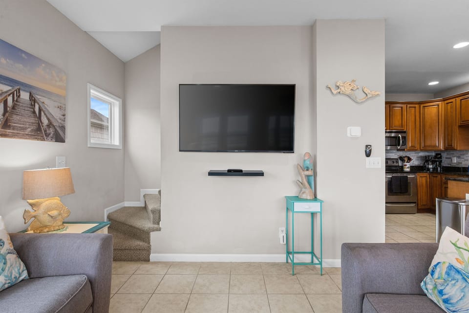 Easy flow from living room to kitchen for effortless group stays