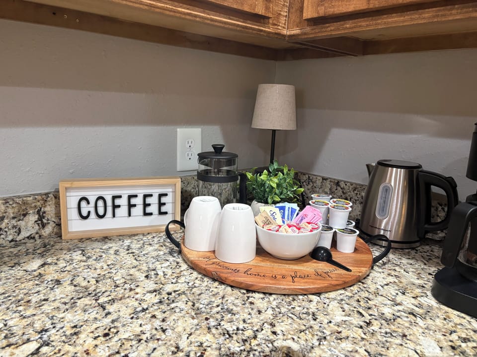 Coffee station with drip coffee K cap in French press, and electric kettle