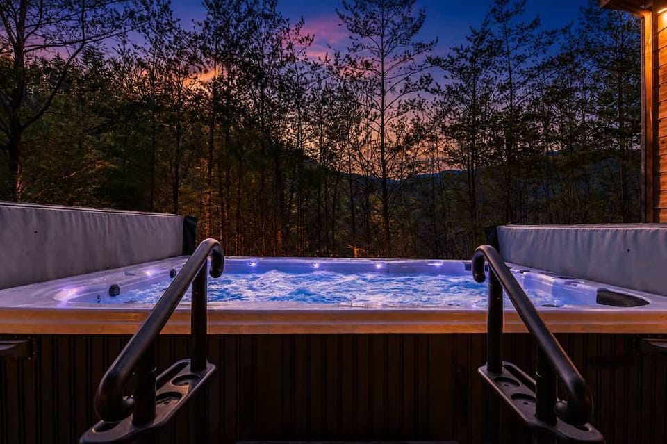 Private sunset hot tub with forest views for the ultimate mountain retreat