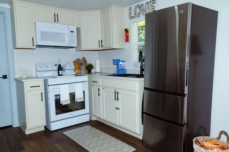 Well-stocked kitchen with full-size appliances for extended stays
