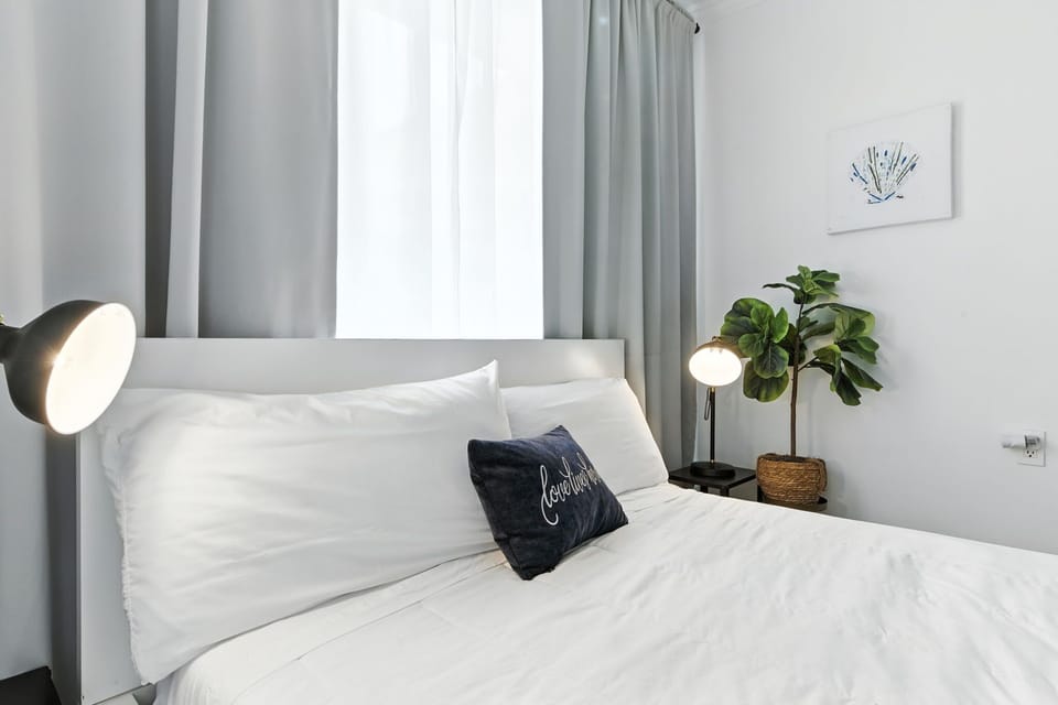 Nice queen bed and night lights to read your books!