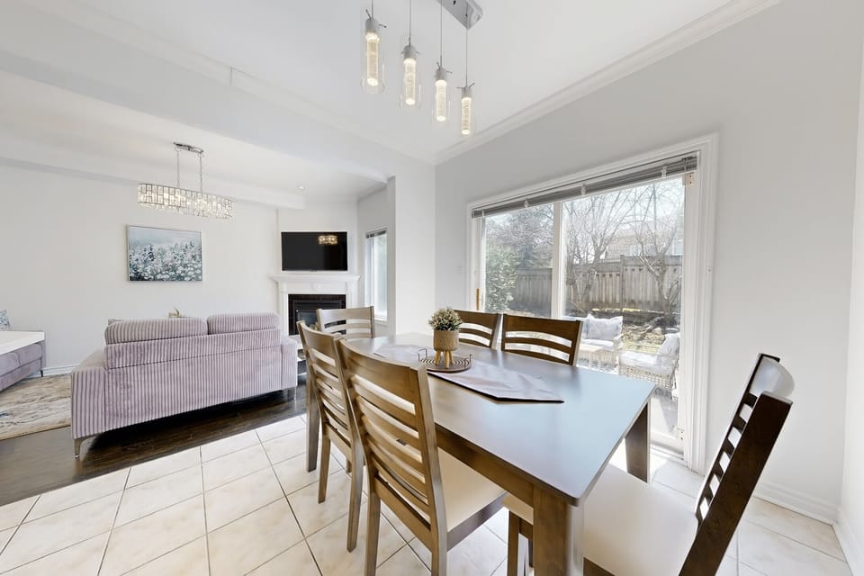 Large dining table set for family meals and gatherings.
