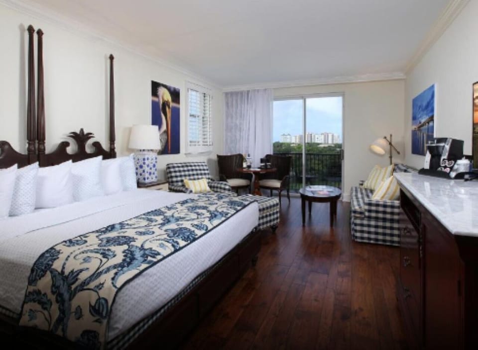 Savor airy mornings with a view from your plush bed.