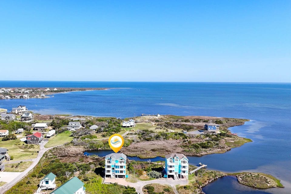 This stunning retreat offers unbeatable views of both the ocean and sound, ensuring you'll experience the best of island living.