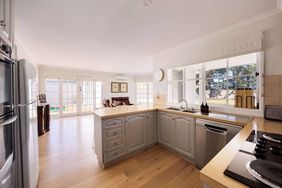 Fully equipped kitchen with electric stovetop, double oven, fridge, dishwasher and microwave. Coffee (pod) machine, kettle and toaster also available