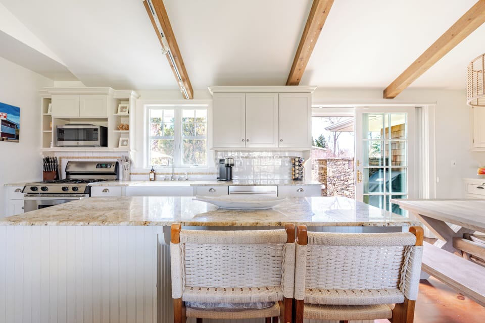 Spacious kitchen island ideal for meal prep and enjoying meals.