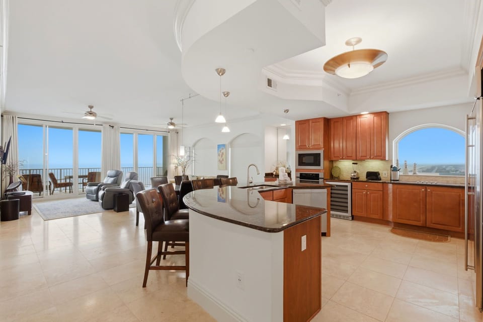 Seamless living, dining, and kitchen spaces for effortless entertaining