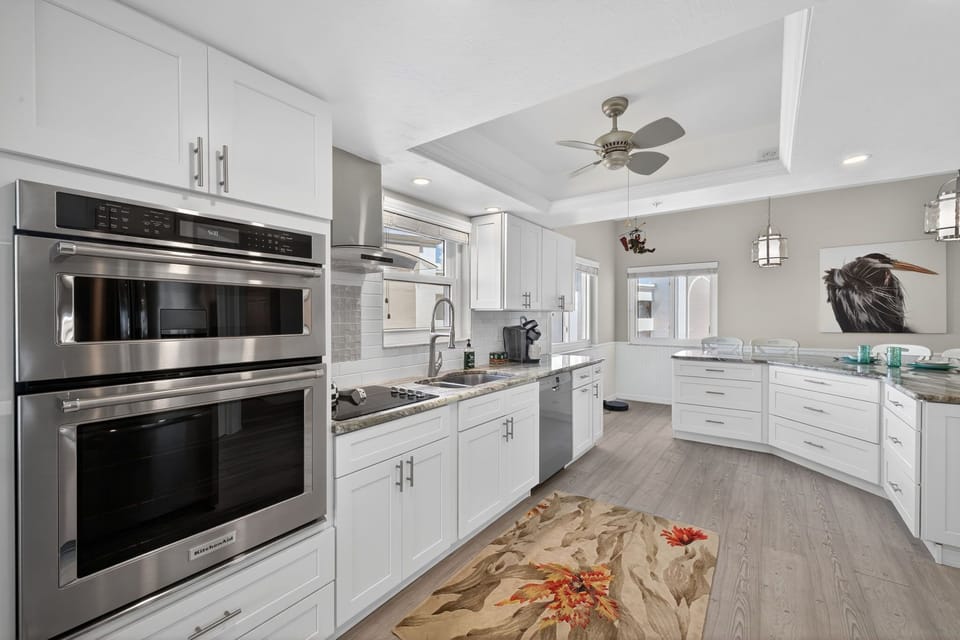Kitchen with a large island and a countertop dining area