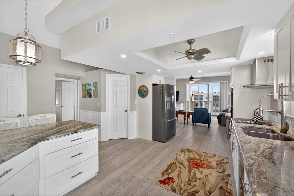 Kitchen with a large island and a countertop dining area