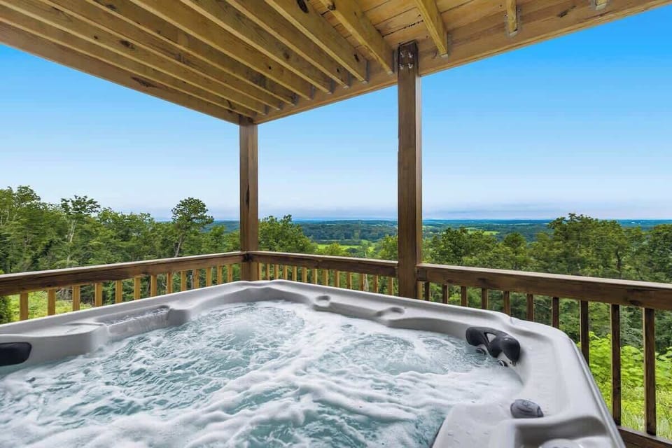 Hot tub on the covered deck with panoramic Shenandoah Valley views