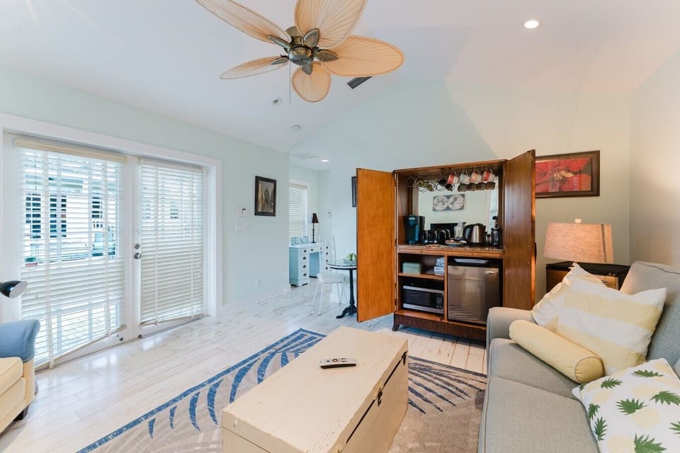 The cabana is separate from the main house with a comfortable living room w/ queen sleeper sofa, amazing view of the pool, queen bedroom and full bathroom
