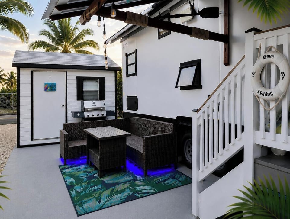 Outside Sitting Area with Rollout Shading and Grill