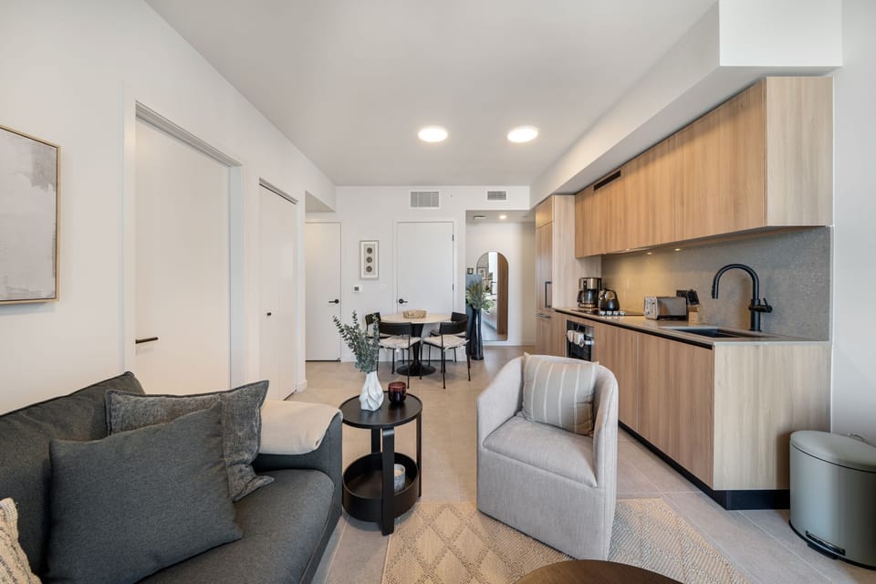Open-concept living and kitchen space with sleek finishes.