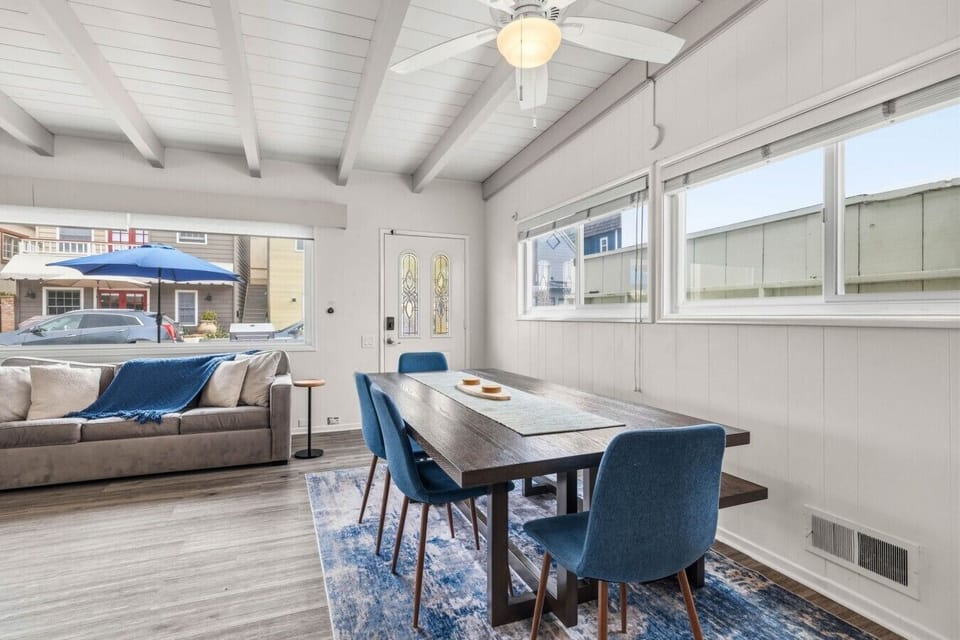 Gather for meals in the open dining area with seating for six, just steps from the living room.