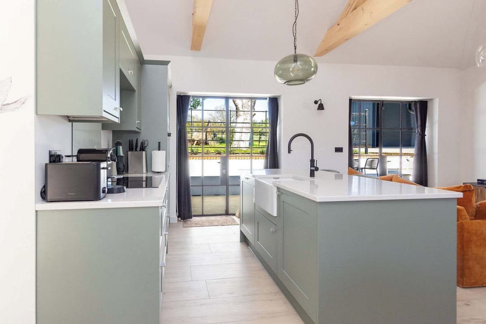 Enjoy a bright modern kitchen, ideal for slow breakfasts before exploring Chichester, Goodwood, and the coast.