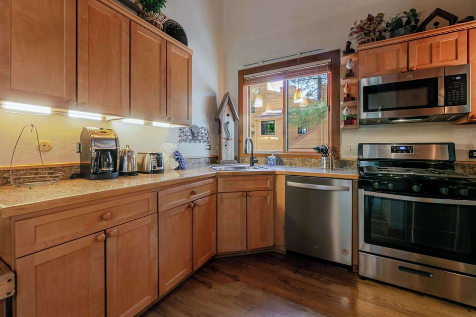 The open kitchen offers ample space & all the comforts of home​