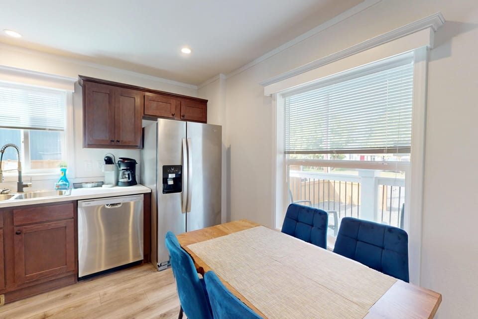 Open kitchen and dining with natural light