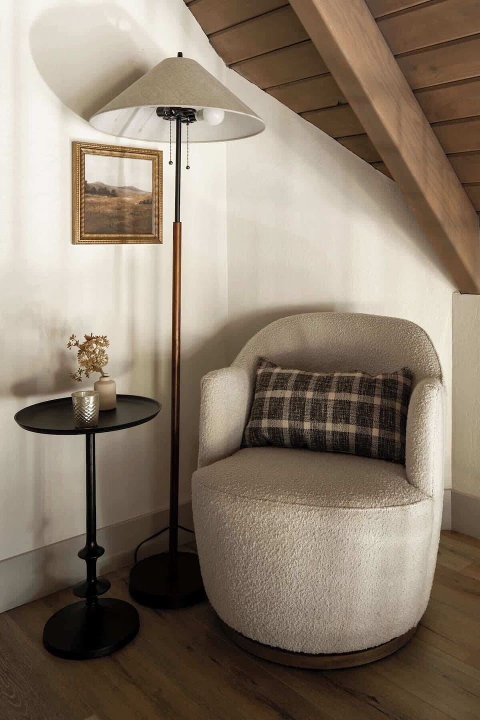 A cozy reading nook at the top of the stairs overlooking the living room. 