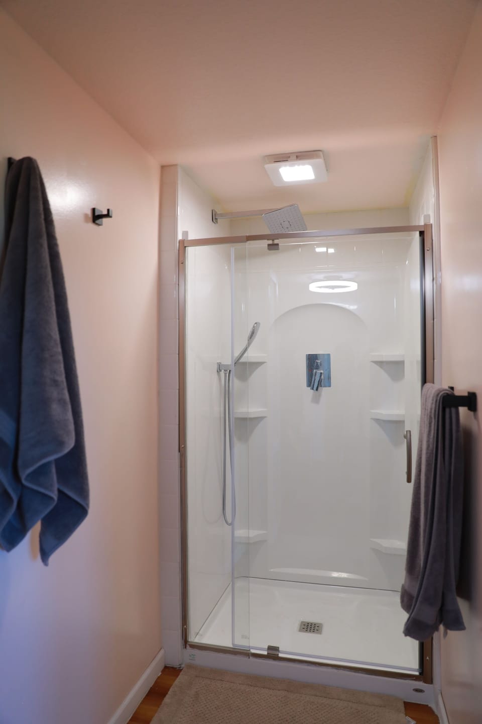 separated bathroom and shower