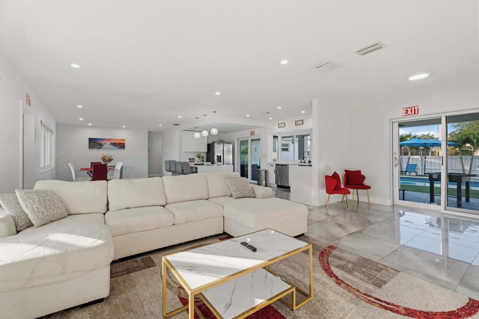 Bright and airy open-concept living room designed for large groups.