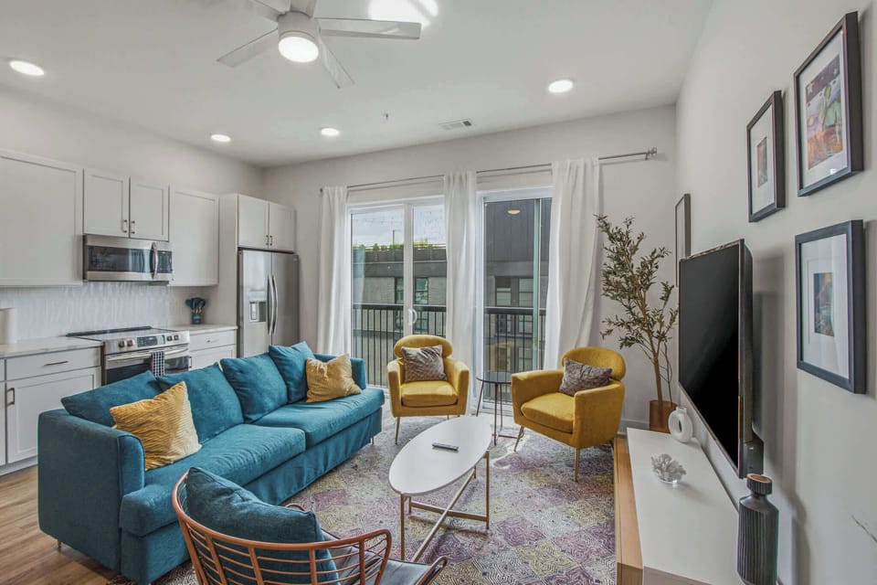 Living Room, bright, inviting space with stylish decor and a sunny balcony for perfect relaxation!