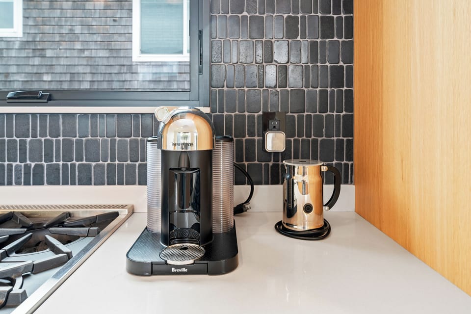 Enjoy morning coffee made with the Nespresso coffee maker and frother.