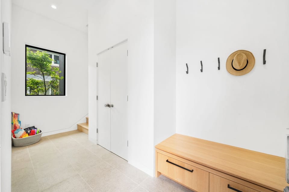 Entry bench seating and coat closet