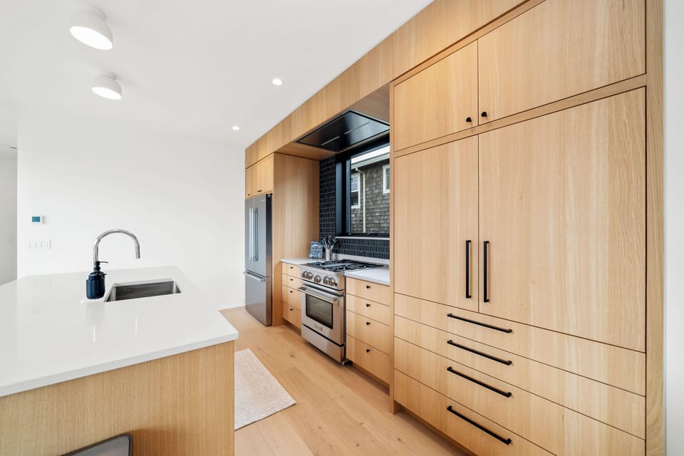 Custom white oak cabinets and high end appliances