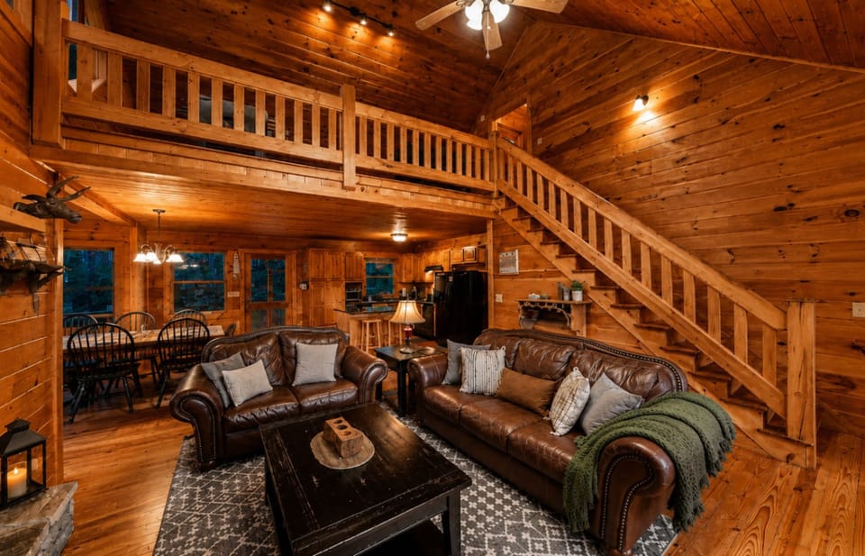 Spacious open-concept cabin with loft and rustic charm