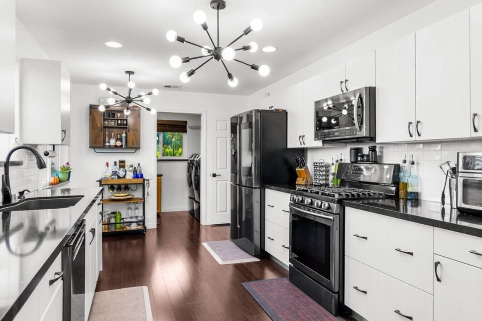 High-end appliances and a smart layout make this kitchen genuinely functional for groups — whether you`re cooking a quick breakfast or a full dinner.