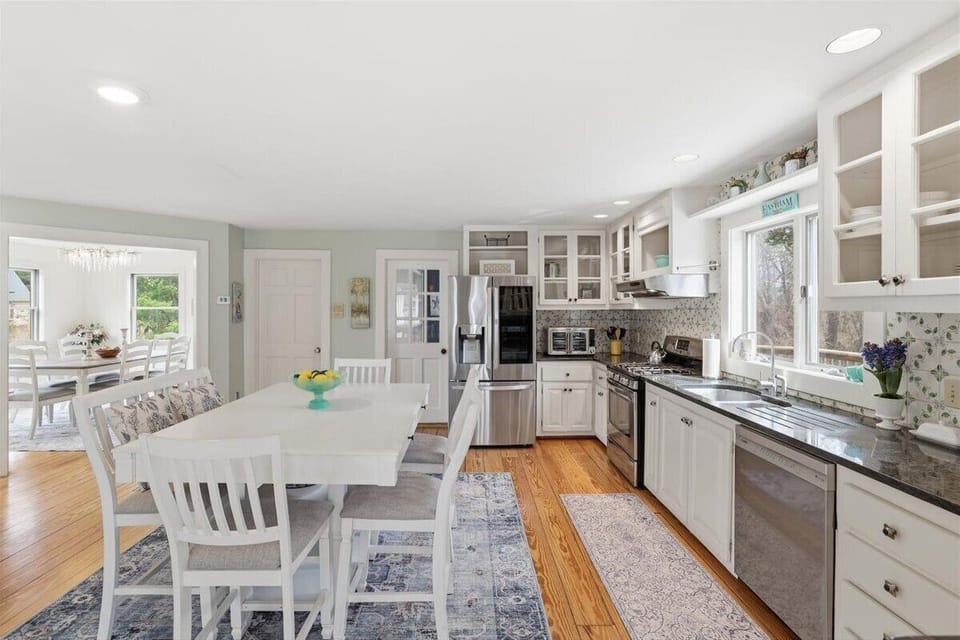 Fully equipped kitchen with stainless appliances.