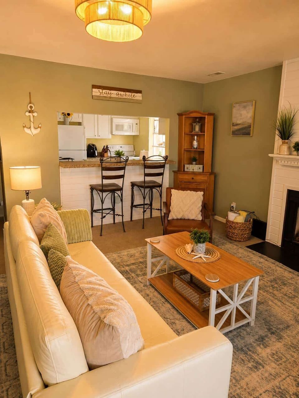 Cozy open-concept living space with warm lighting, comfortable seating, and stylish modern décor.