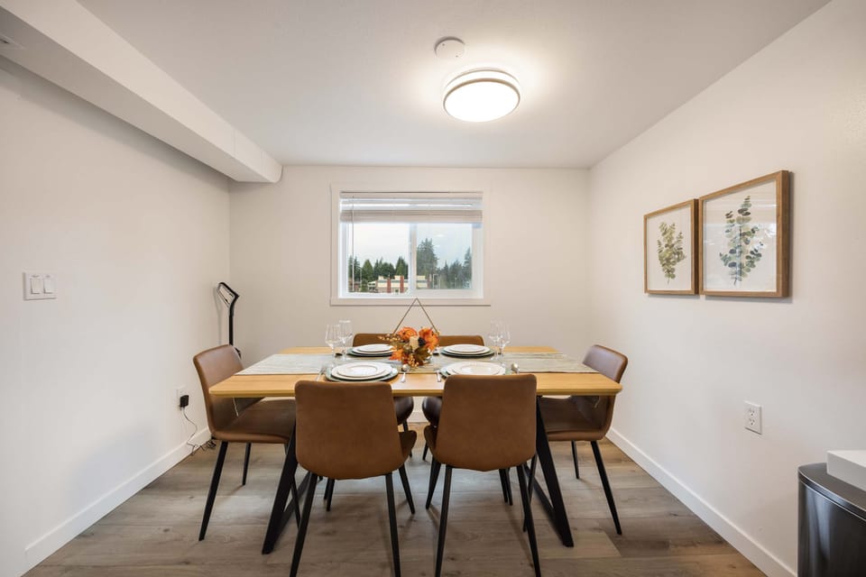 Dining table for shared meals in a bright and inviting setting.