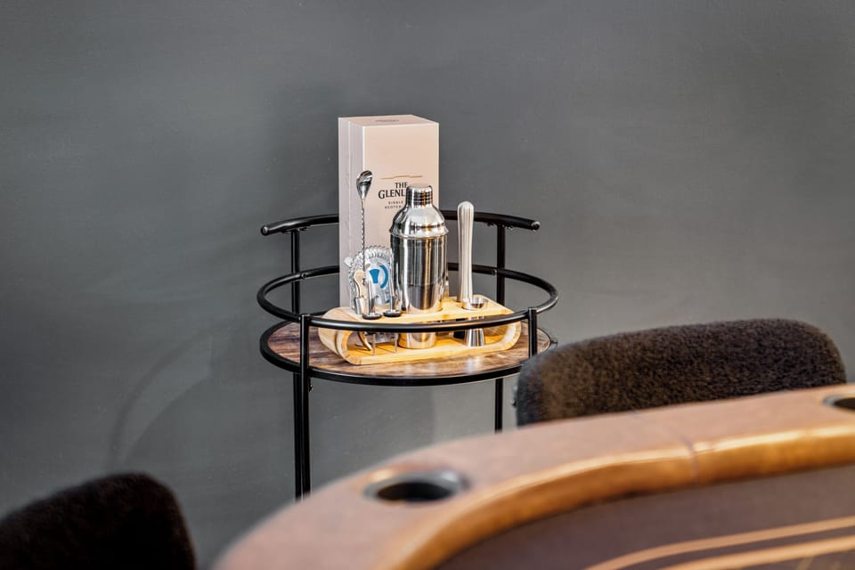 Play the night away while sipping your favorite cocktails — a mixology set is provided (alcohol not included)