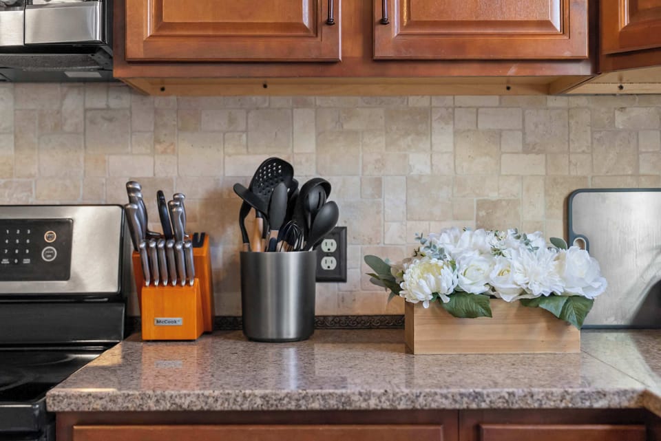 The cozy kitchen is well equipped for an unforgettable getaway​