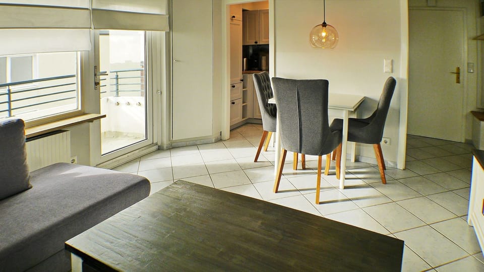 Bright Living Room with Dining Area and Sofa