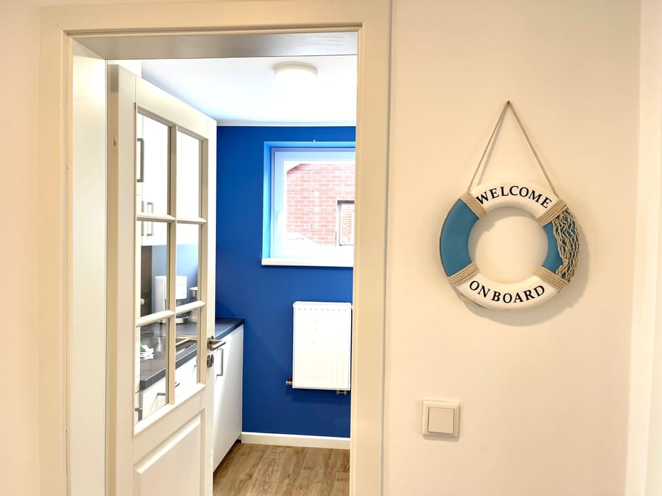 Kitchen with Blue Design and Maritime Decor