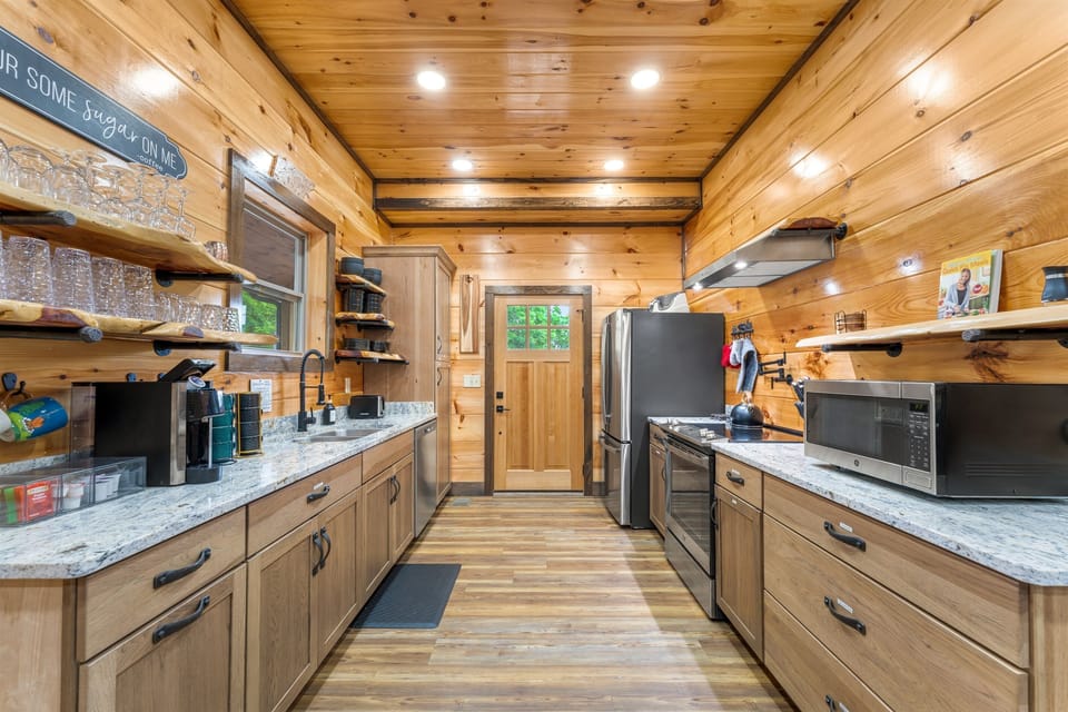 Cook family meals with ease in the fully stocked kitchen equipped with everything needed for your stay.