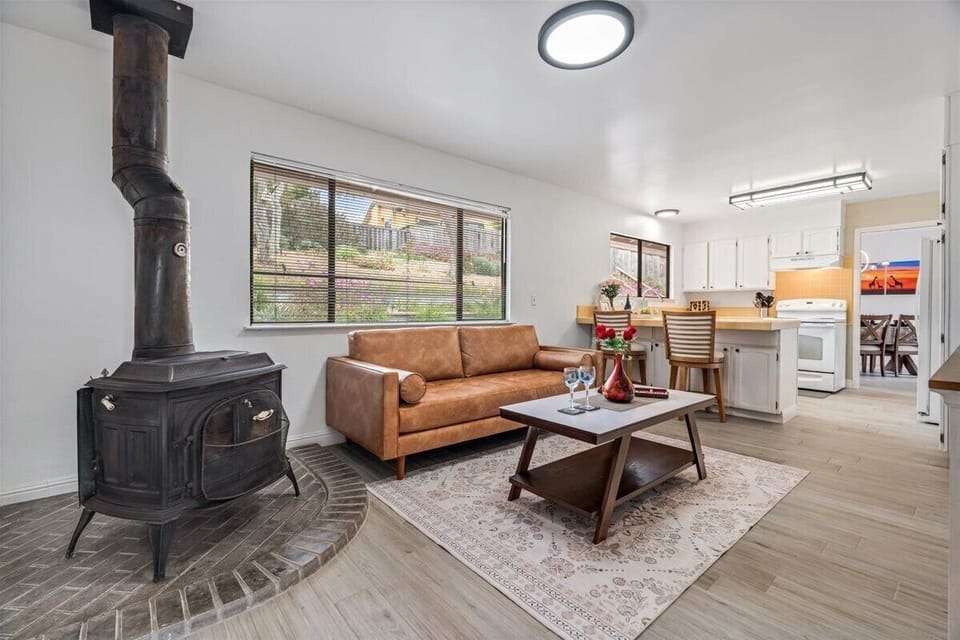Family Room with Large Smart TV (Wood Stove Decorative Only)