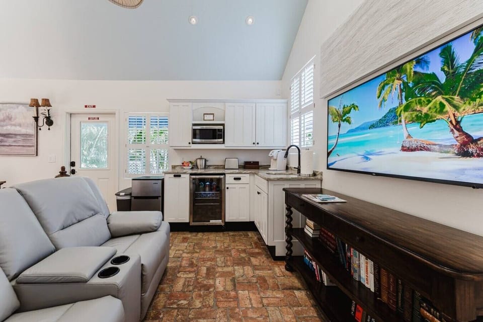 Relax in plush seating with a full kitchenette and entertainment options, creating a perfect home away from home.