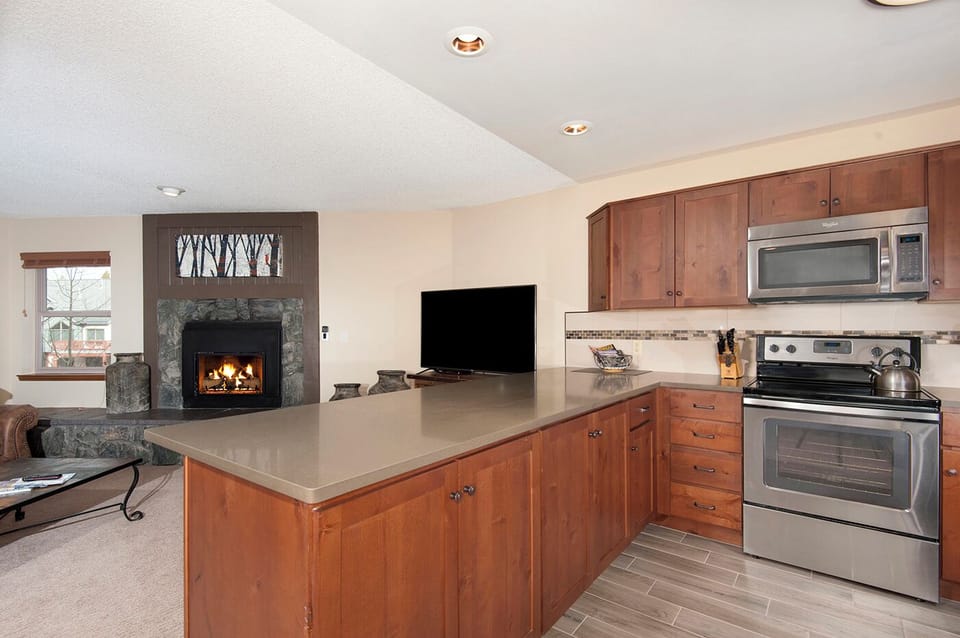 Kitchen looks out to Living Room