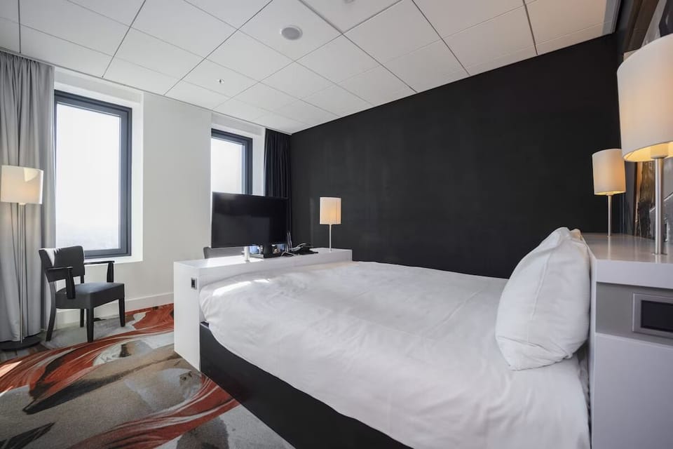 Wake up to daylight and calm, minimalist comfort.