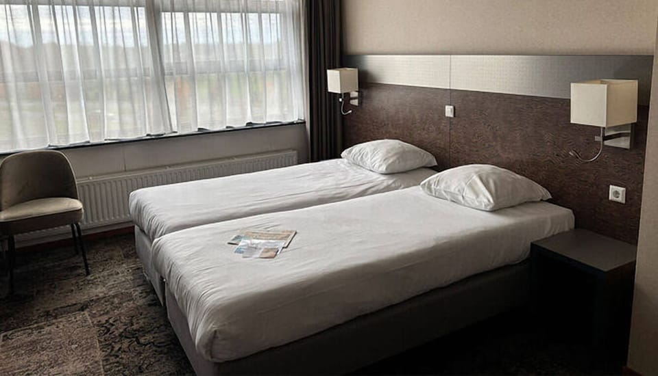 Settle into crisp twin beds for restful, quiet sleep.