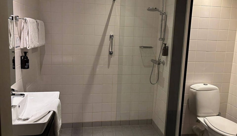 Get ready easily with a full bath layout and walk-in shower