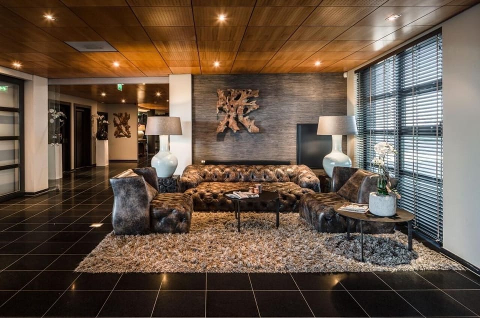 Settle into plush sofas for calm chats and cocktails.