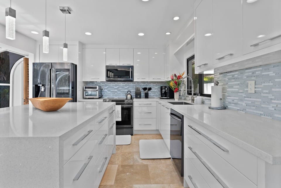 Bright finishes and premium appliances offer everyday ease.