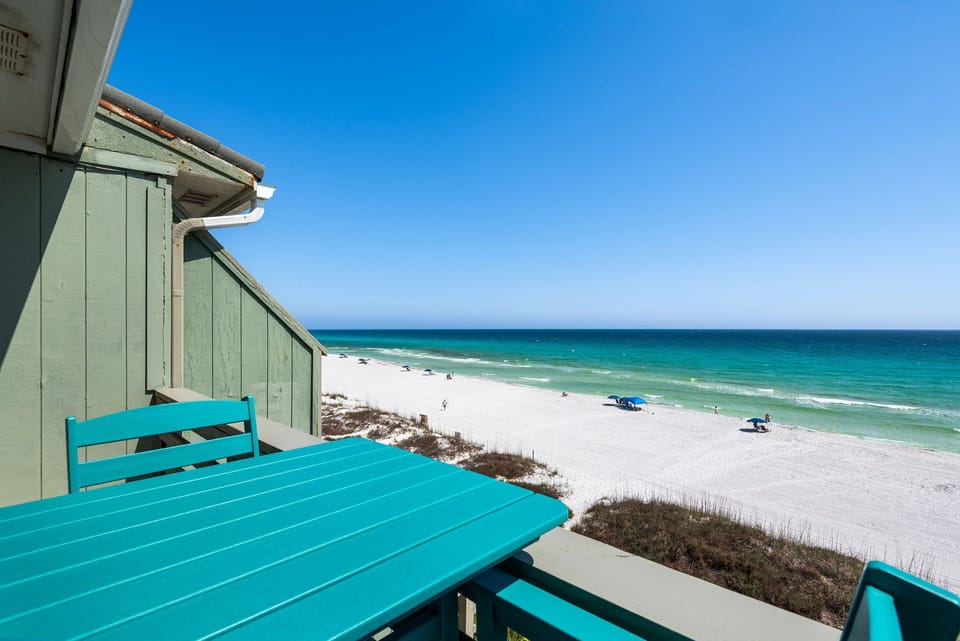 Stunning beachfront property featuring direct access to pristine white sand beaches and crystal-clear turquoise waters.