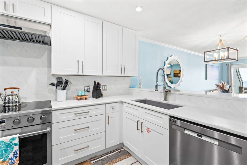 Fully equipped kitchen with stainless steel appliances — perfect for preparing memorable meals together.