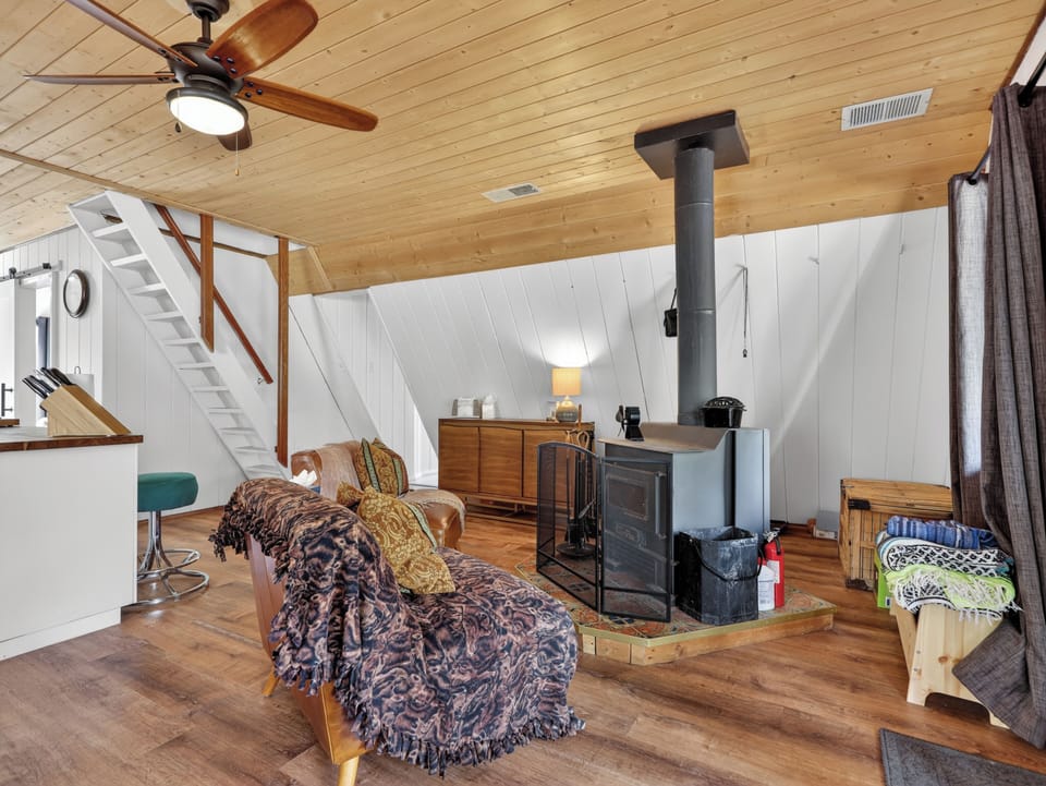 Relax by the wood-burning stove after a day of mountain adventures